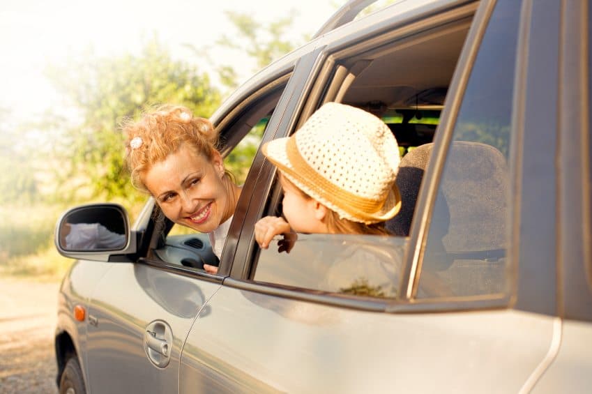 mom and daughter inside the car