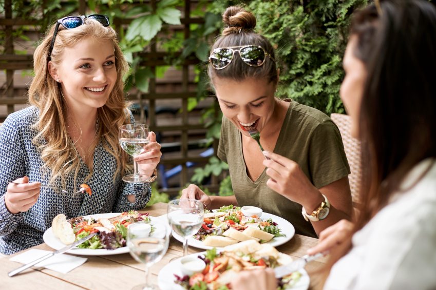 group of friends eating outside